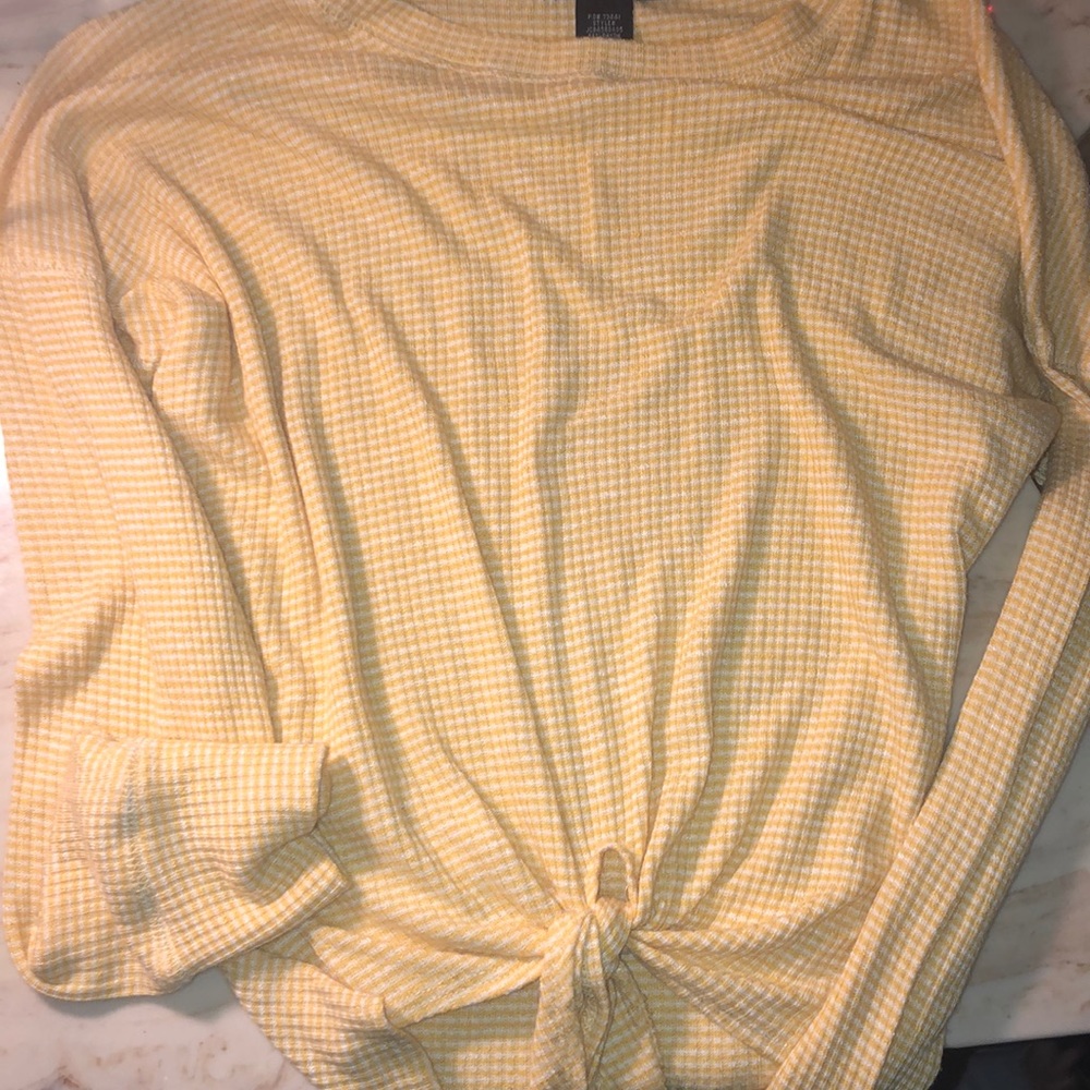 yellow long sleeve shirt